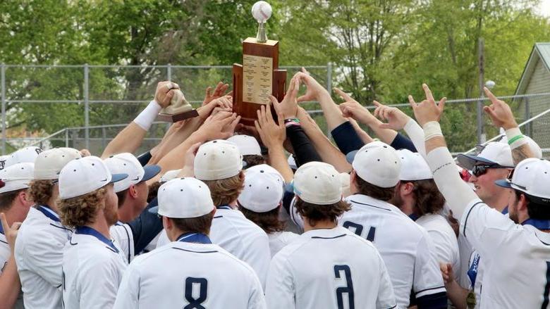 The Penn State DuBois baseball team lifts the PSUAC trophy after securing the conference title for the second year in a row.